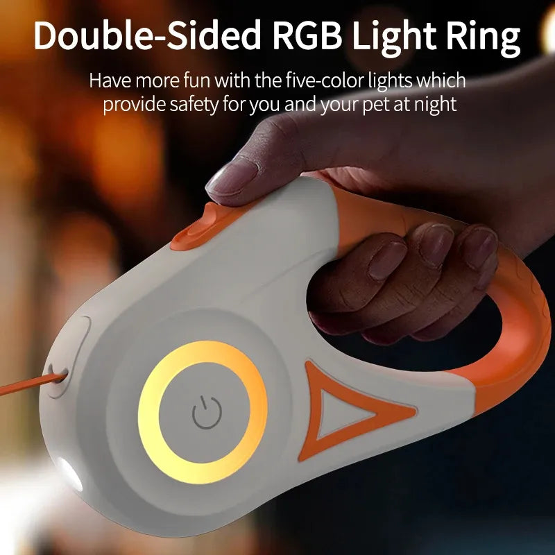 Dog leash with double-sided orange RGB light ring held by a hand with text about safety lights.