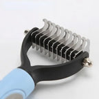 Pet grooming tool with metal blades on a white background
