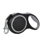 Black retractable dog leash with silver clip on a white background