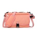 Pink portable changing pad on white background