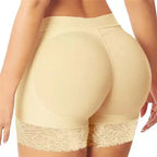 Beige shapewear with lace trim on a white background
