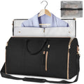 Black  travel bag with a blue shirt on a hanger and a clear pouch inside.