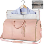 Pink  travel bag with a blue shirt on a hanger and a clear pouch inside.